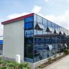 Red four-slope roof T-shaped prefabricated house