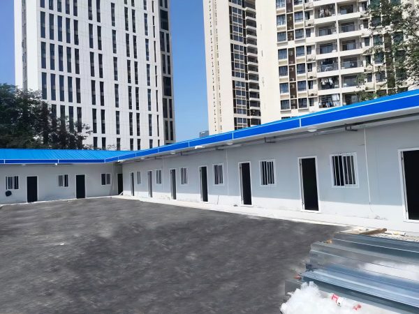 241ddc36ed7496913c009f135b74e8b Blue four-slope roof T-shaped prefabricated house