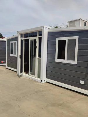 Prefabricated three-in-one foldable and expandable double-wing container house