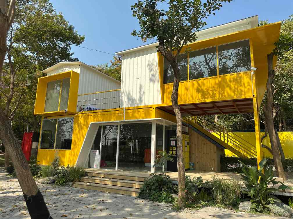 yellow and white detachable container shop exterior design