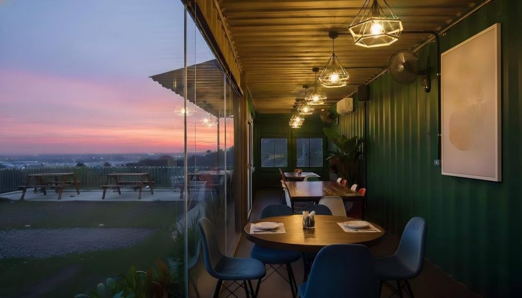 panoramic glass container restaurant overlooking scenery