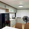 White three-bedroom expandable container unit