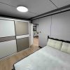 2026_06_04_18_54_IMG_1863 Two-level 20-foot expandable unit with wood-grain finish
