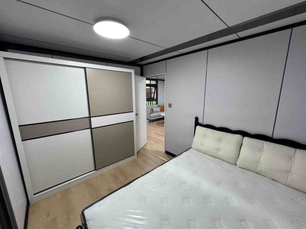 2026_06_04_18_54_IMG_1863 Two-level 20-foot expandable unit with wood-grain finish