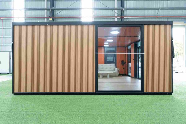 _DSC2113 20-foot expandable container with a wood-look exterior and glass walls