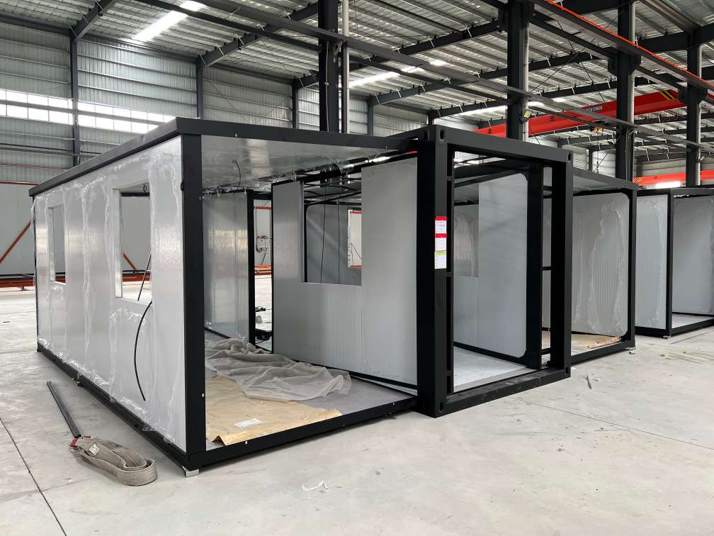 Installation of wall panels for a 20-foot expandable container house