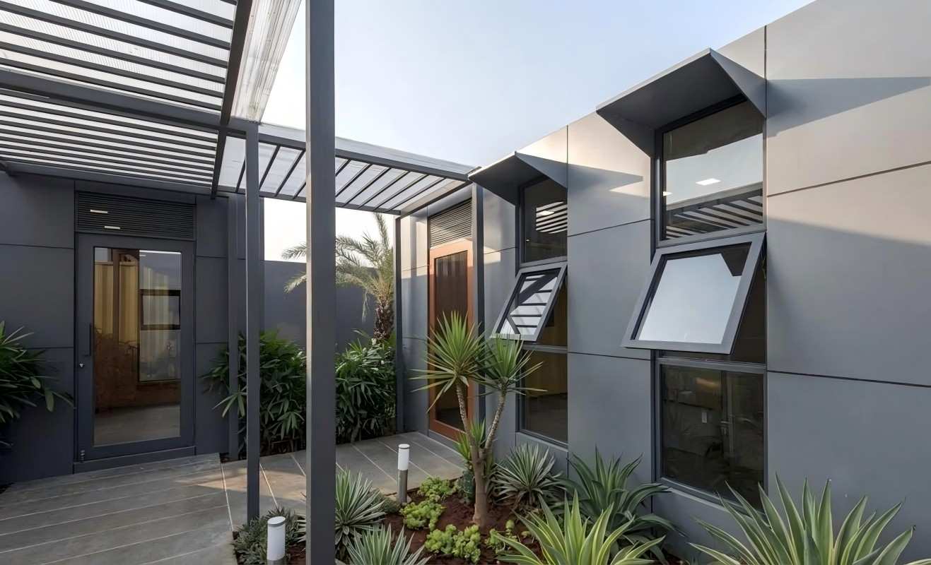Modular container conference room with natural lighting and customized office furniture