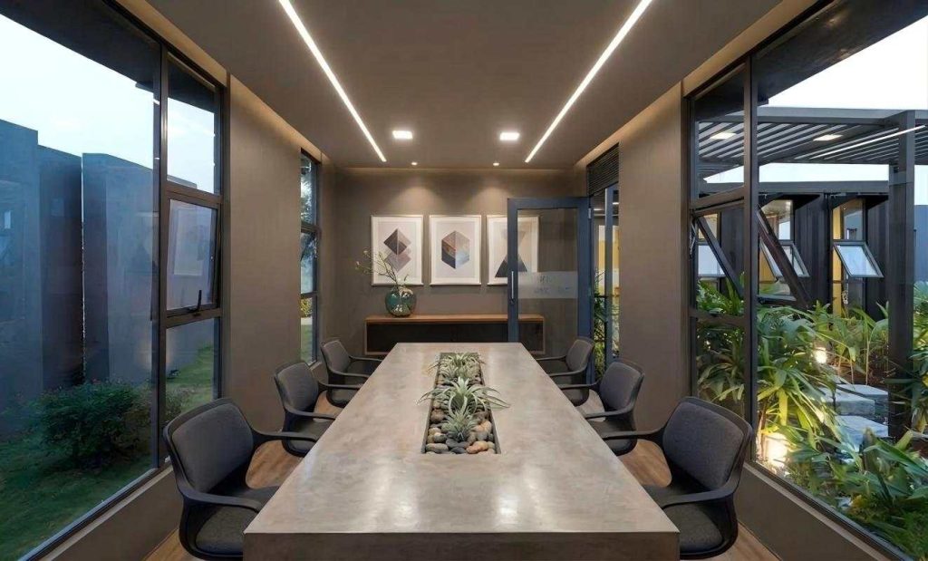 Modular container conference room with natural lighting and customized office furniture