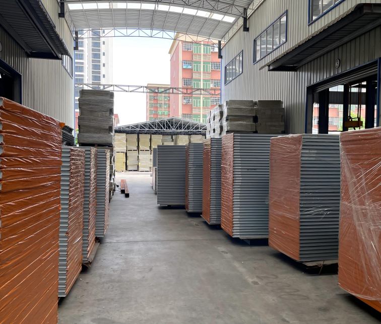 Steel structure sandwich panels ready for shipment inside container house factory warehouse