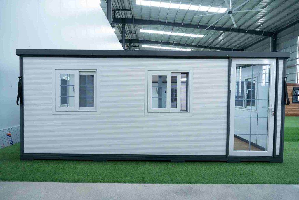 Double wing expandable container house exterior with modular steel frame structure for residential use