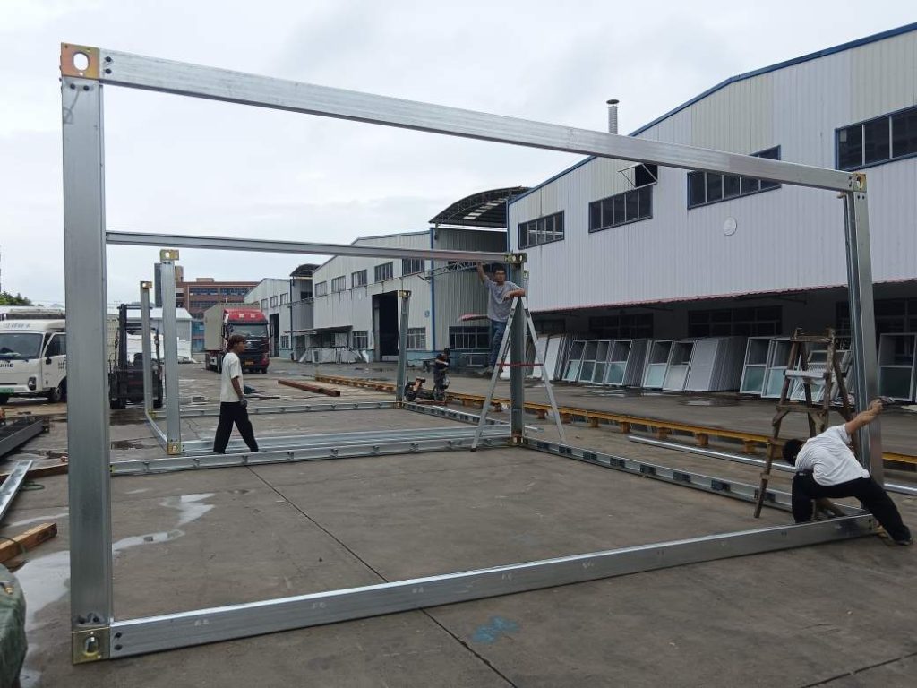 Factory pre-assembles custom steel structure container house frame for installation testing