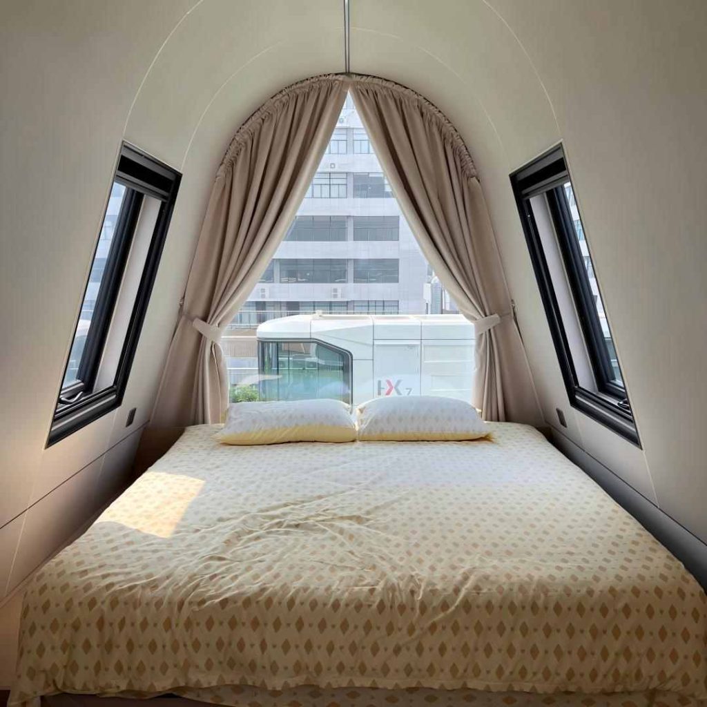 Triangular cabin hotel guest roombedroom